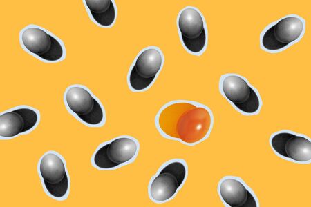 Modern minimalistic easter pattern. Black and white eggs with one brown egg on yellow background.