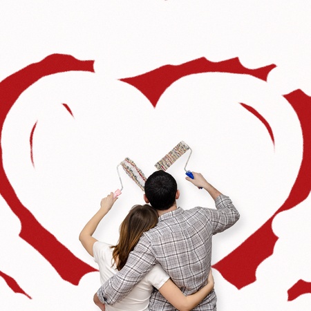 Young family painting together the loveの写真素材