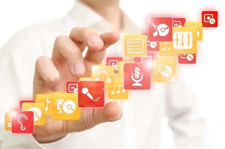 Man choosing music media applicationsの写真素材