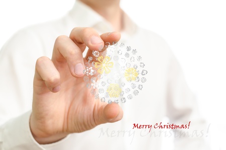 Man holding Christmas bubble ornamentの写真素材