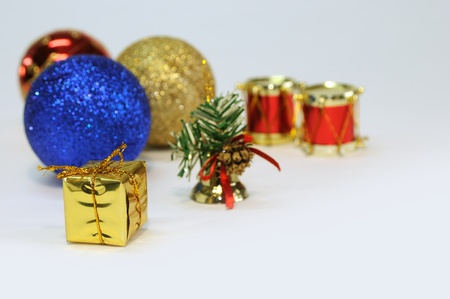 Colorful christmas decoration with little golden gift boxの写真素材
