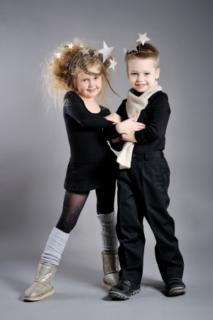 portrait of little boys and girls in the studio in a Christmas styleの写真素材