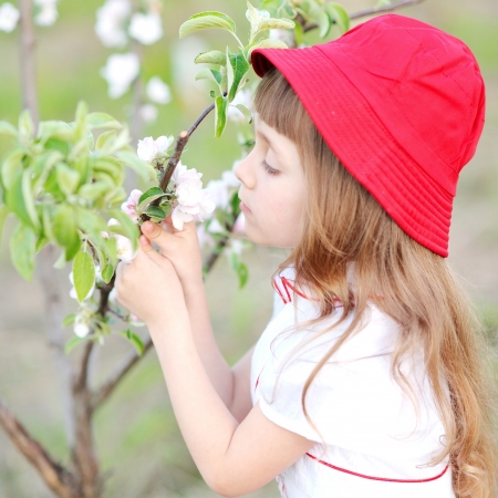 portrait of a beautiful girl with flowersの写真素材