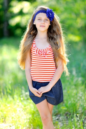 portrait of little girl outdoors in summerの写真素材