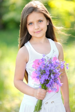 portrait of little girl outdoors in summerの写真素材
