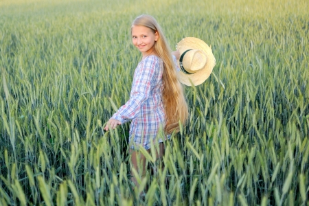 portrait of little girl outdoors in summerの写真素材