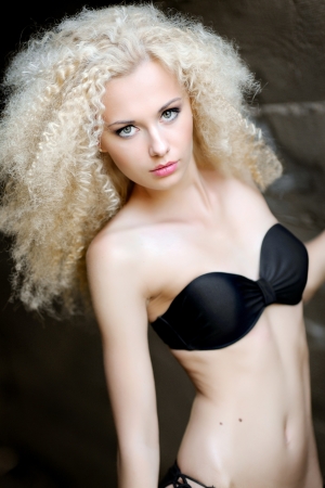 portrait of a beautiful young girl in a bikiniの写真素材