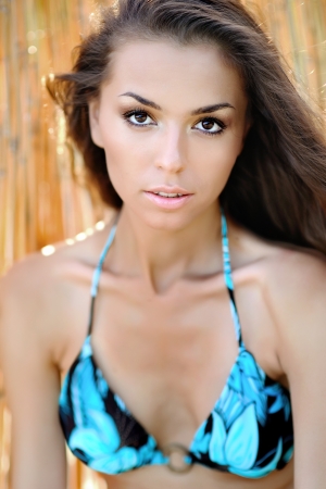 portrait of a beautiful young girl in a bikiniの写真素材