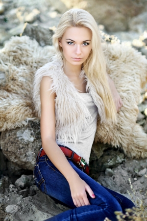 portrait of a beautiful young girl in furの写真素材