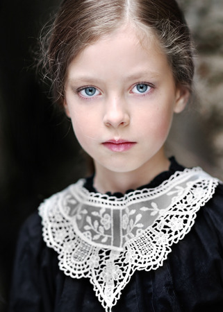portrait of a little girl in vintage styleの写真素材