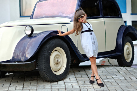 portrait of a beautiful fashion little girlの写真素材