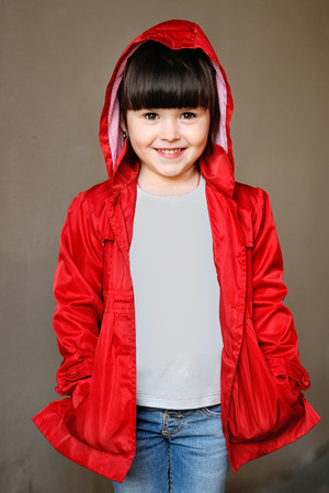portrait of little girl outdoors in autumnの写真素材