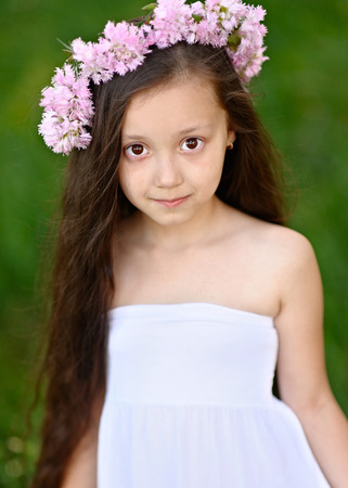 portrait of little girl outdoors in summerの写真素材