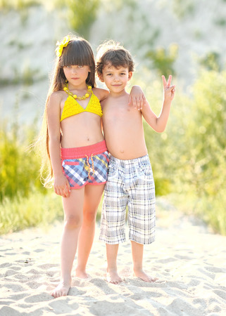 Portrait of children on the beach in summerの写真素材