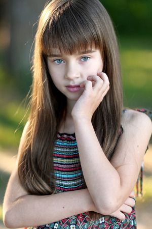 portrait of little girl outdoors in summerの写真素材