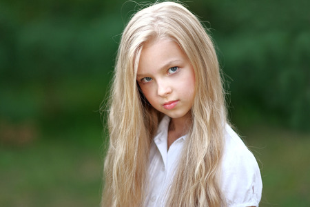 portrait of little girl outdoors in summerの写真素材