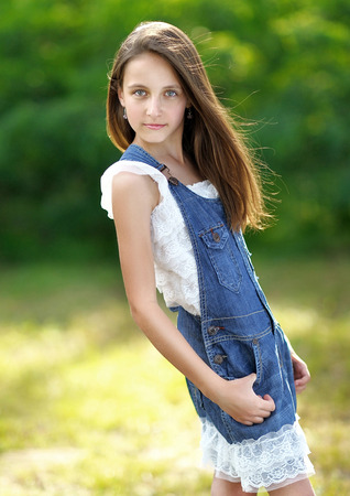 portrait of little girl outdoors in summerの写真素材