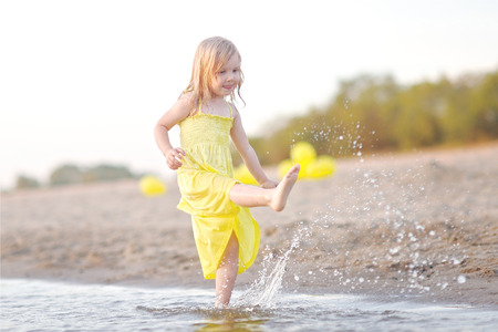 portrait of little girl outdoors in summerの写真素材