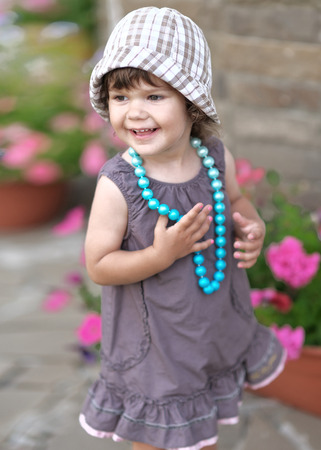 Portrait of little girl outdoors in summerの写真素材