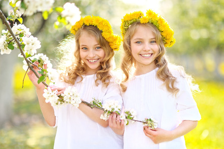 Portrait of two little girls twinsの写真素材