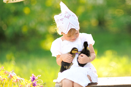 portrait of little girl outdoors in summerの写真素材