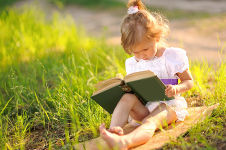 portrait of little girl outdoors in summerの写真素材