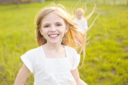 portrait of little girl outdoors in summerの写真素材