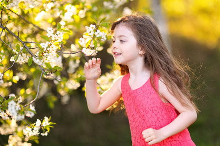 portrait of little girl outdoors in summerの写真素材