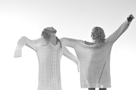 portrait of two sisters during the autumn harvestの写真素材