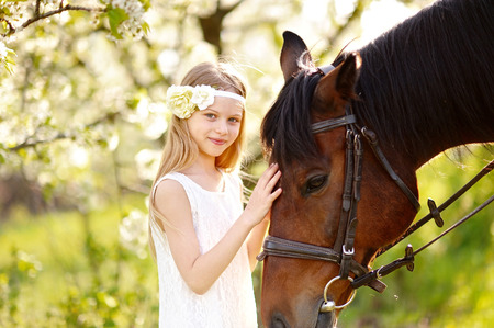portrait of little girl outdoors in summerの写真素材