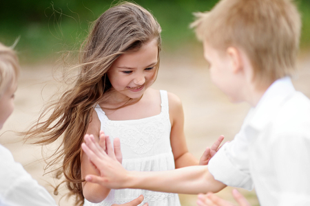 Portrait of a boy and girl in summerの写真素材