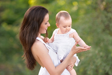 portrait of mother and daughter in natureの写真素材