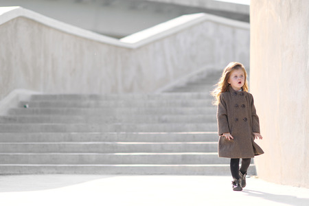 portrait of little girl outdoors in autumnの写真素材