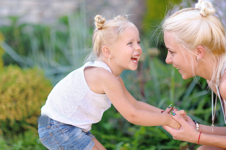 portrait of a happy family in the summer on the natureの写真素材