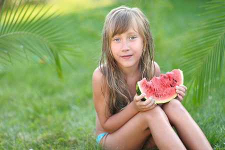 portrait of little girl outdoors in summerの写真素材