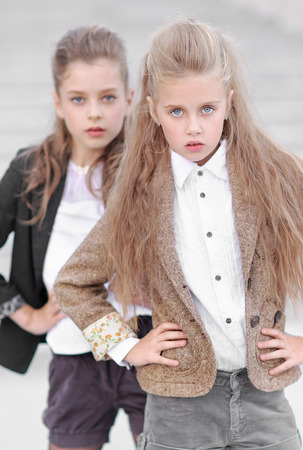 portrait of two girls of girlfriends on a summer natureの写真素材