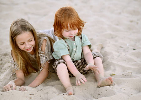 Portrait of a boy and girl  in summerの写真素材