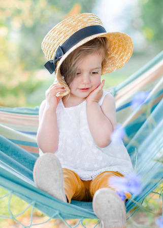 portrait of little girl outdoors in summerの写真素材