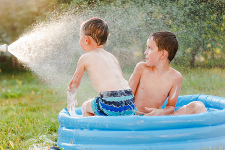 Portrait of two boys in the summer outdoorsの写真素材