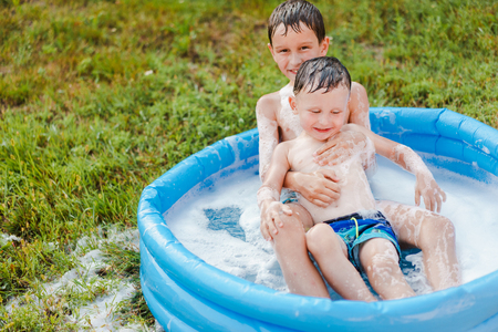 Portrait of two boys in the summer outdoorsの写真素材