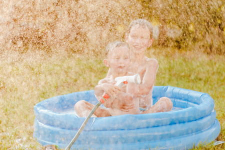 Portrait of two boys in the summer outdoorsの写真素材
