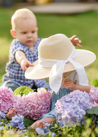 Portrait of a boy and girl  in summerの写真素材