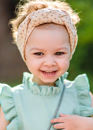 portrait of little girl outdoors in summerの写真素材