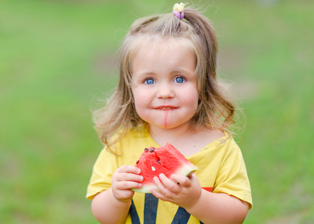 portrait of little girl outdoors in summerの写真素材