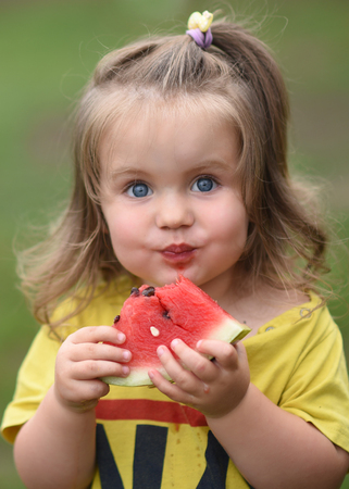 portrait of little girl outdoors in summerの写真素材