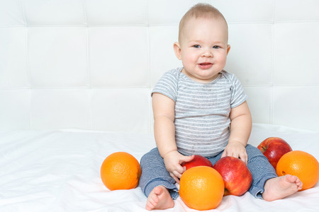portrait of a little boy playing indoorsの写真素材