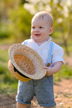 portrait of a Little boy playing in summer natureの写真素材