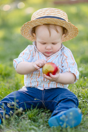 portrait of a Little boy playing in summer natureの写真素材