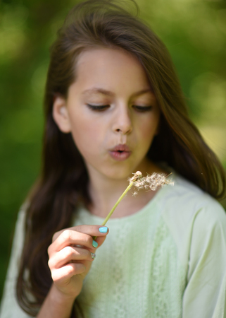 portrait of young girl outdoors in summerの写真素材