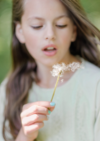 portrait of little girl outdoors in summerの写真素材